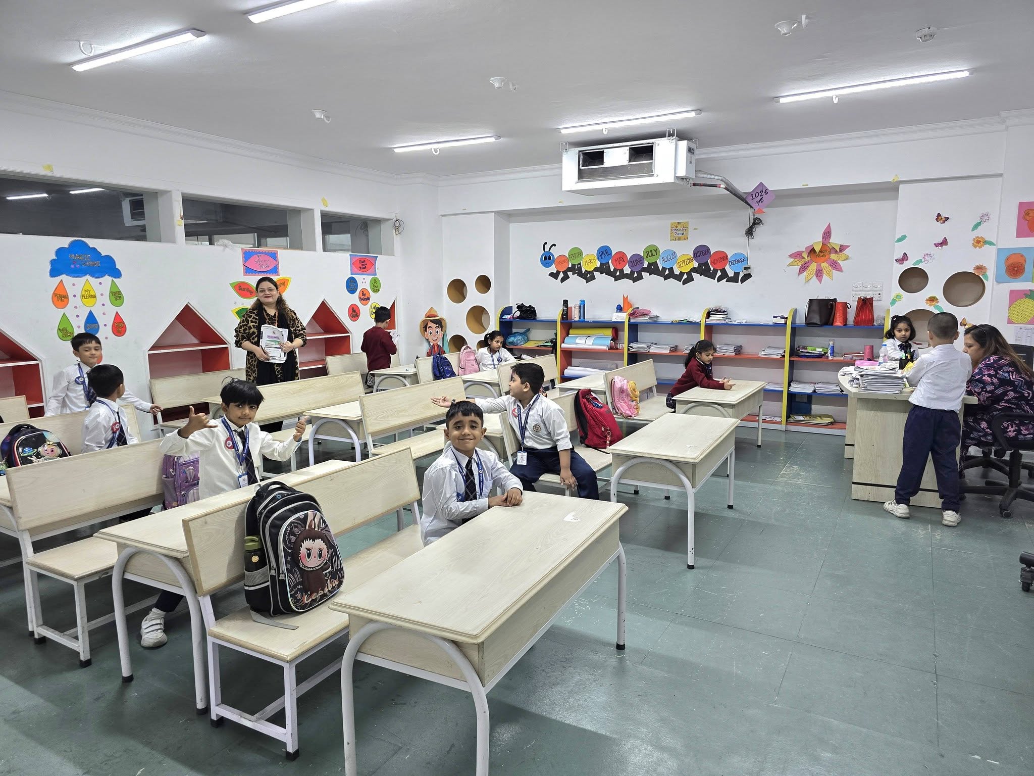 Qualified teacher guiding a student during a classroom activity